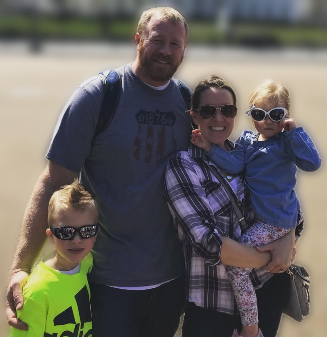 William & Allison Thomas, owners of DiNetta Property Management, with their family